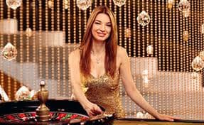 Evolution Gaming live-dealer studio with multiple camera angles and dealer at control panel